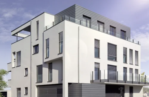 Moderne mehrstöckige Wohnanlage mit Glasbalkonen und grauen Fassadenelementen